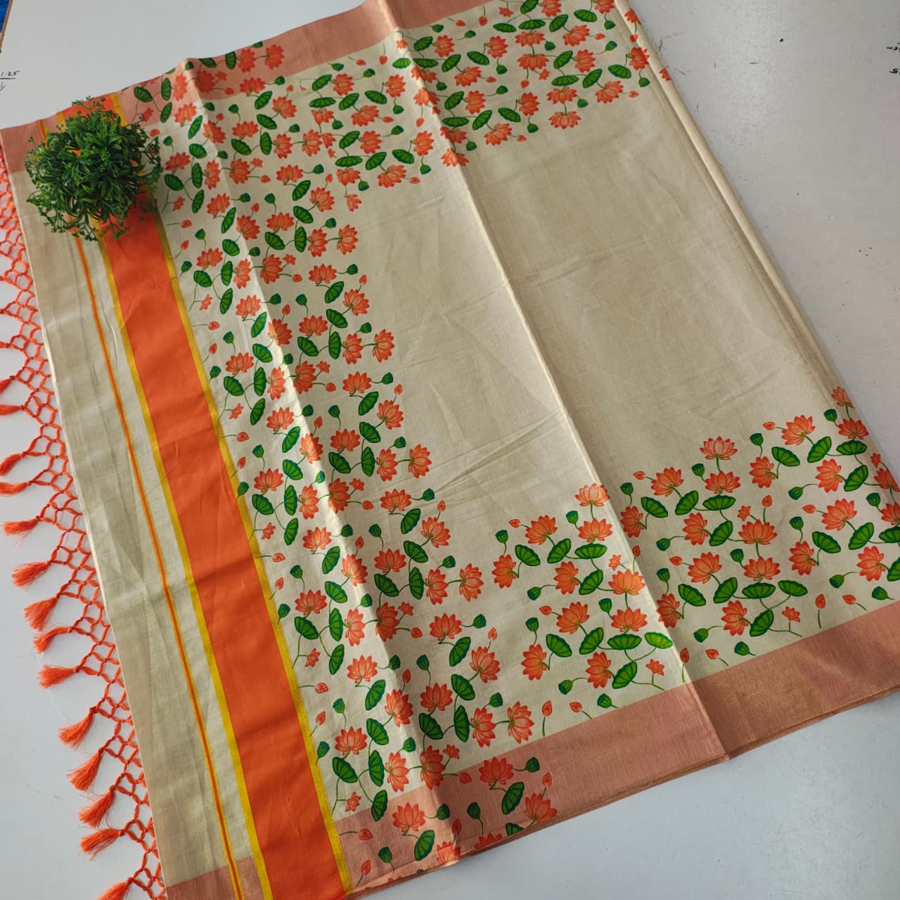 Lotus Print Kerala Tissue Saree with Kasavu Border