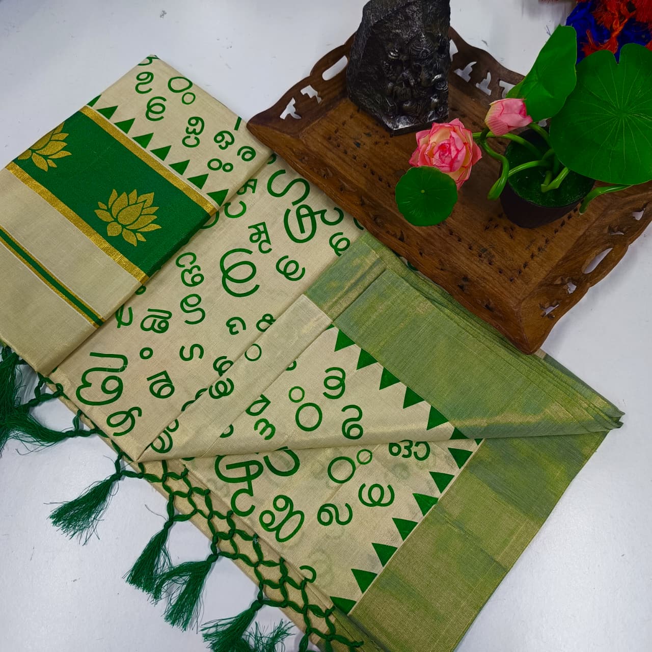 Aksharamala Golden Tissue Saree with Lotus Border & Hand Knot Tassels