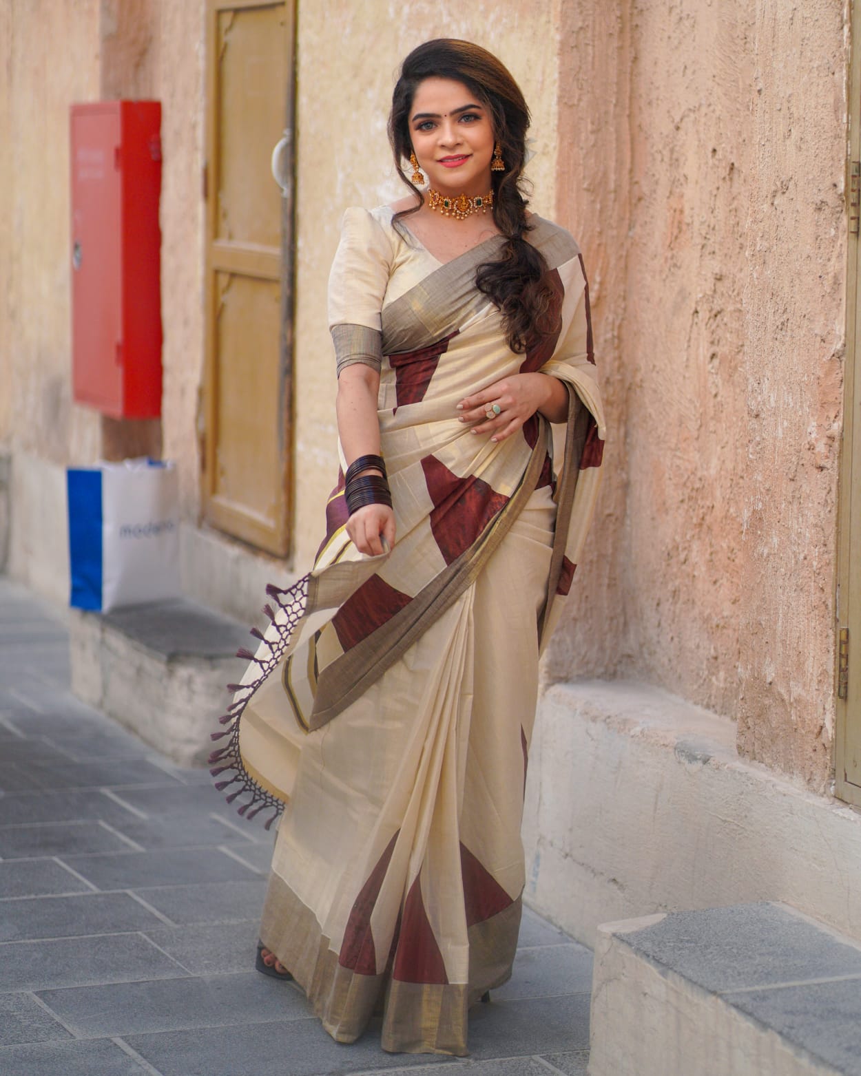 Golden tissue coffee brown temple print saree