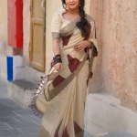 Golden tissue coffee brown temple print saree